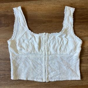 Pretty white cotton eyelet top. LA HEARTS cute crop summer
Size XS